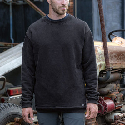 Male worker wearing The Crew Sweatshirt by 1620 Workwear in Black