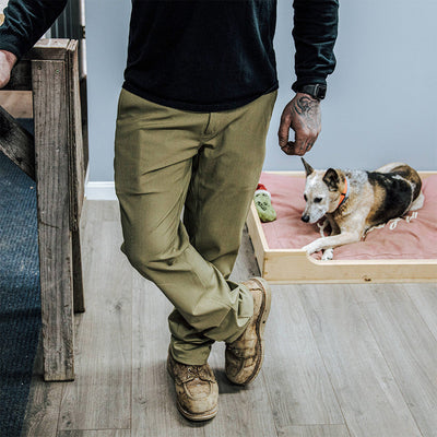 Men's Shop Pant being worn in a casual setting with a dog